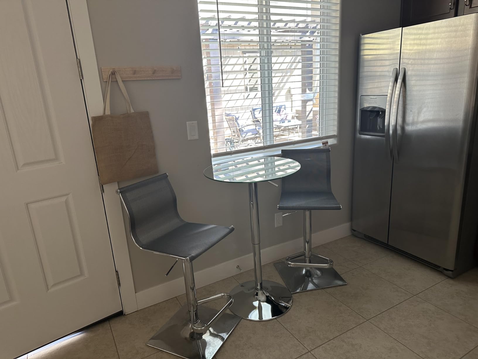 Flash Furniture Chad 23.5'' Round Glass Cocktail Table with Adjustable Height Frame, Bar Height Table for Commercial or Residential Use, Clear/Chrome customer photo 2