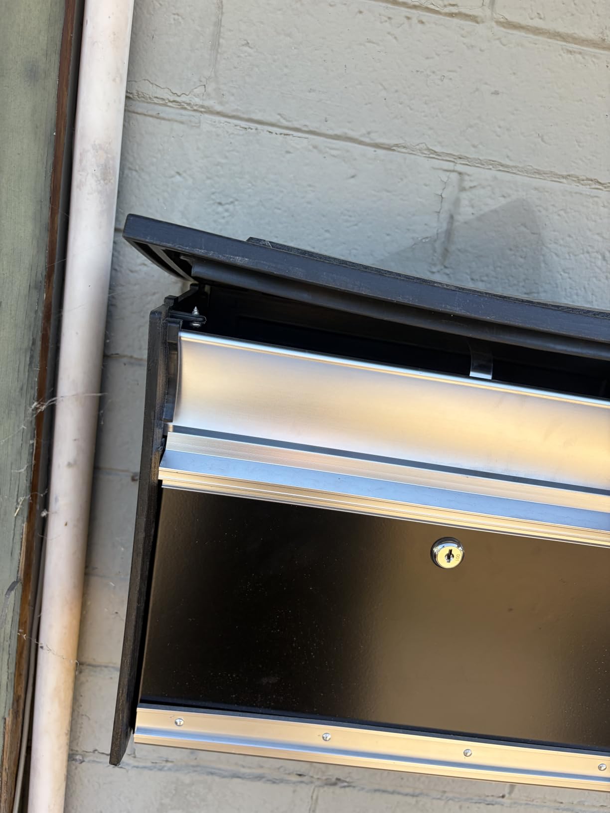 Architectural Mailboxes Mailsafe Locking Wall Mount Mailbox, Black, Medium | Aluminum build with steel cam lock and key drop box and a rust-resistant powder-coat finish. customer photo 1