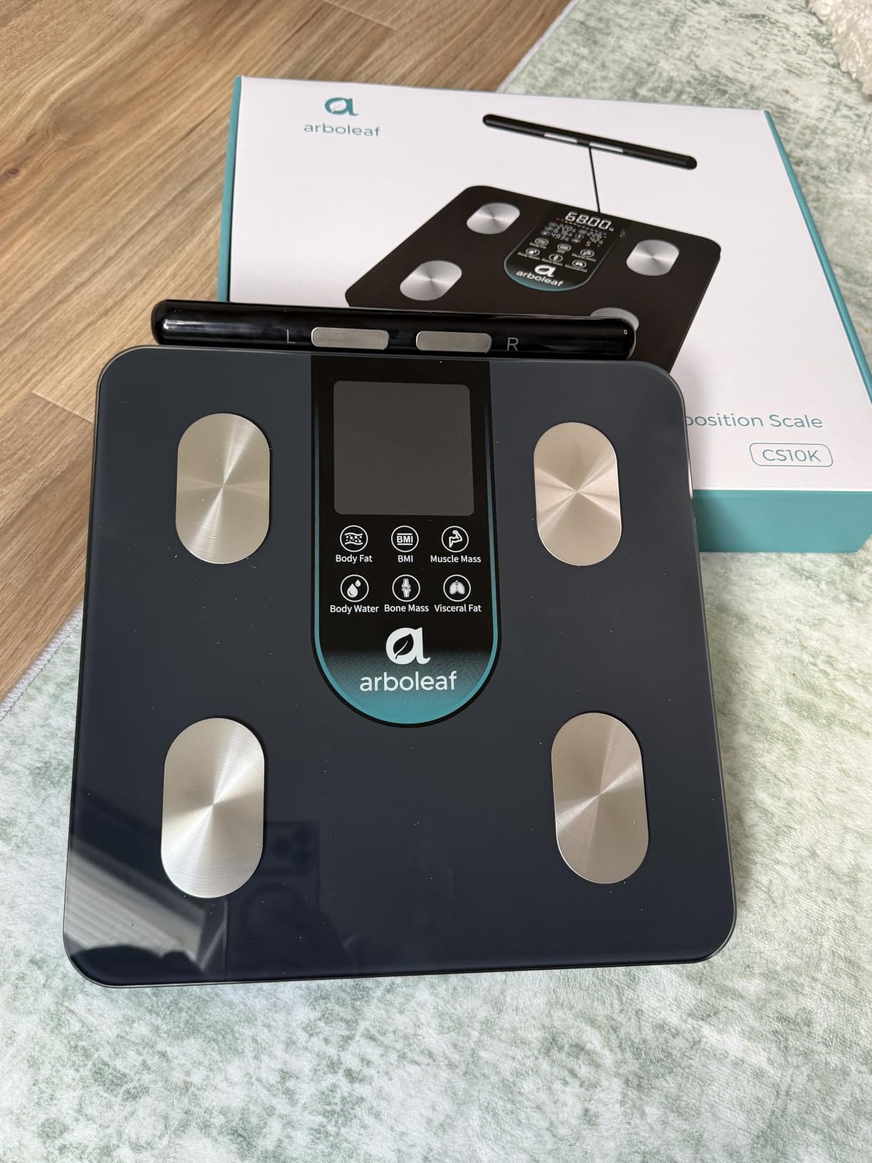 Smart Scale for Body Weight, 8-Electrode Scale with Handle | App unlocks 50+ metrics, trend history, family profiles, and report sharing, while the display shows 7 key stats at a glance customer photo 2