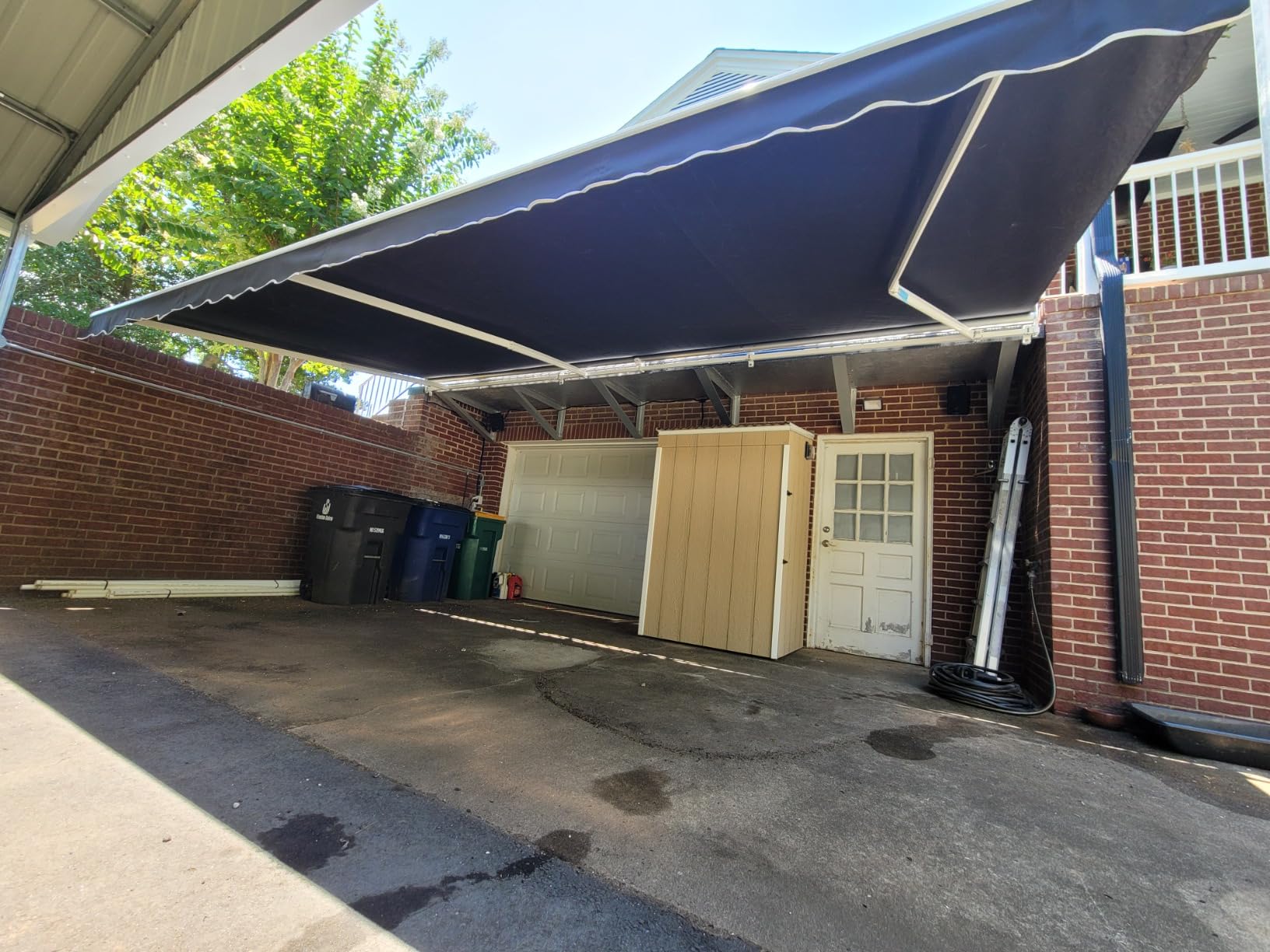 ALEKO Electric Patio Awning Caribbean White Frame 10x8 Black | Retractable sunshade for decks and balconies, remote-controlled extension, water-resistant fabric, rust-free aluminum frame customer photo 2