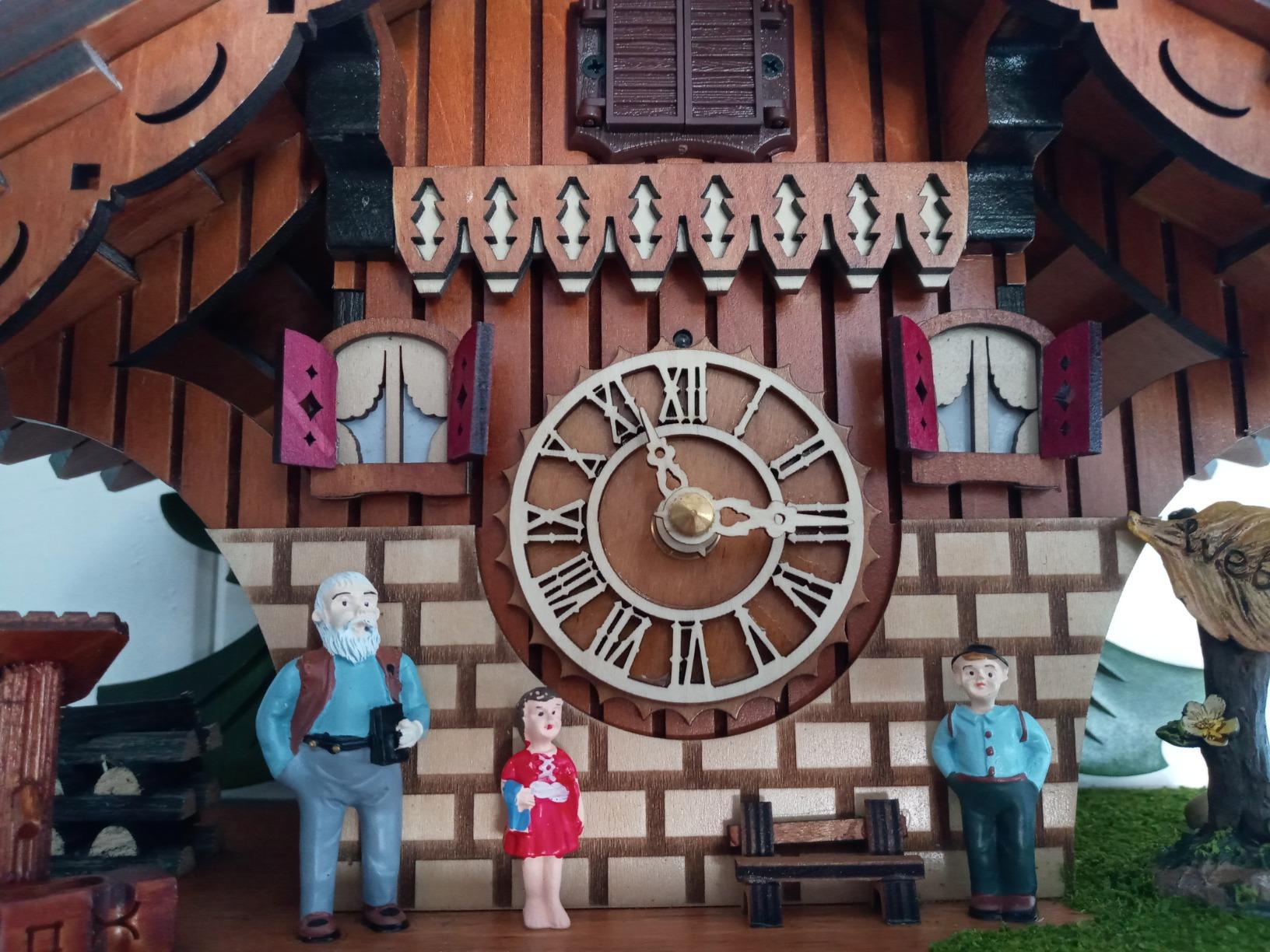 Kintrot Cuckoo Clock for Wall: A Happy Family with a Cute Puppy | Traditional Black Forest Chalet Wooden Clock with Singing Bird and Playing Melodies customer photo 1