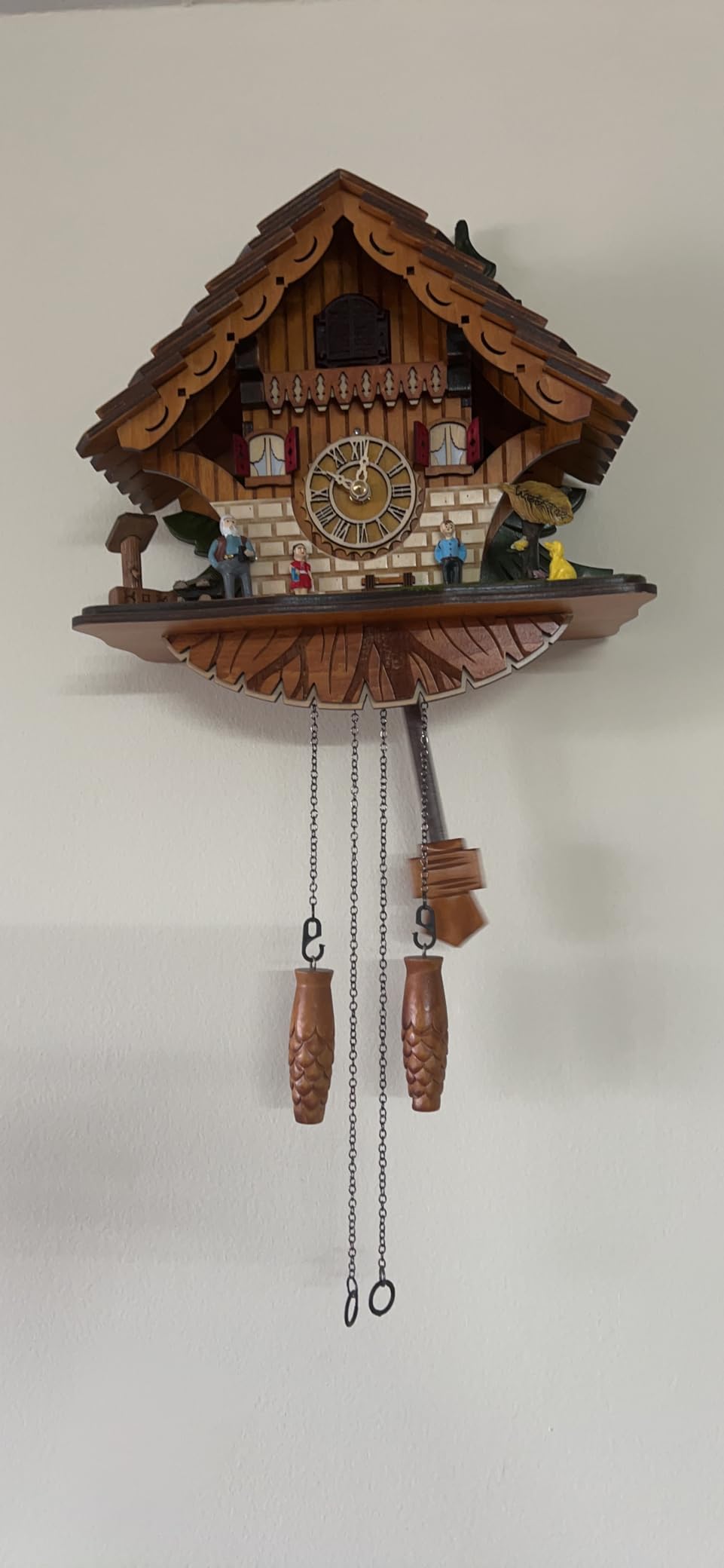 Kintrot Cuckoo Clock for Wall: A Happy Family with a Cute Puppy | Traditional Black Forest Chalet Wooden Clock with Singing Bird and Playing Melodies customer photo 2