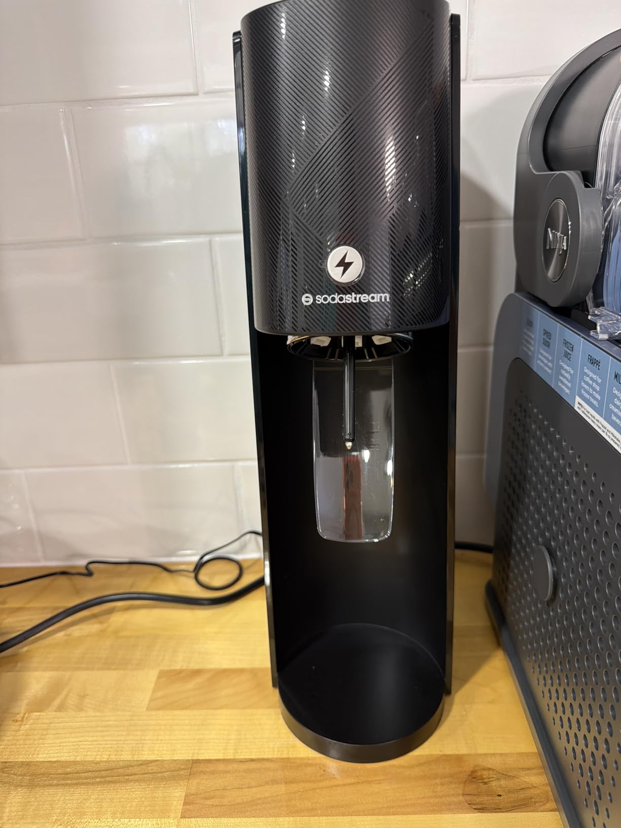 SodaStream E-TERRA Soda Maker | VALUE BUNDLE | 3 Automatic Carbonation Levels | Includes 2x CO2 Cylinders, 3x 32 Fl Oz Dishwasher Safe Bottles, 2x Bubly Fruit Flavor Drops, 1x Power Adapter | Black customer photo 2