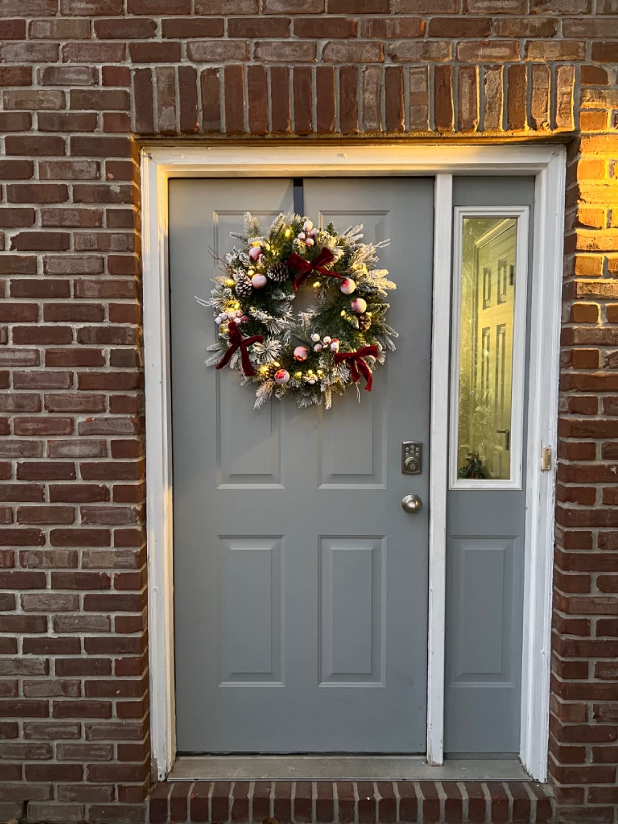 Pre-lit Snow Christmas Wreath with Red Balls, Berries and Bows, 24 Inch 50 Battery Operated LED Lights, Holiday Decoration for Front Door Outdoor customer photo 1