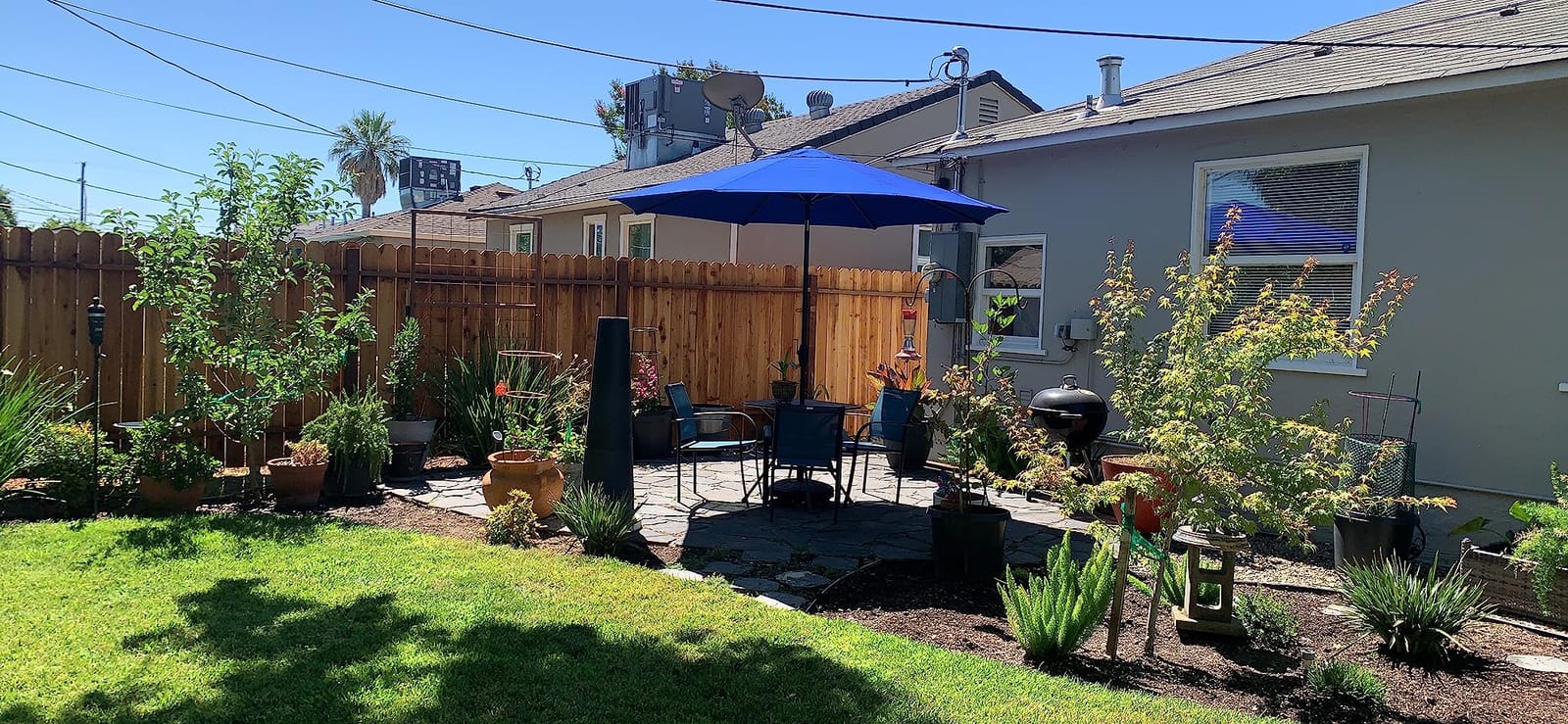 Lean - 10 Ft Patio Umbrella, Dark Blue Canopy | Fade-Resistant Sunbrella Fabric with 8 Ribs and Auto-Tilt Crank, Outdoor Umbrella for Deck, Pool and Garden, Black Pole customer photo 1