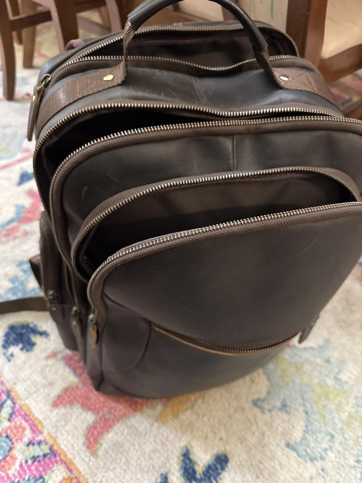 TIDING Genuine Leather 17.3 Inch Laptop Business Backpack for Men, Black | Thick Sponge Padded Laptop Sleeve, Small Water Bottle Holder, Luggage Strap, Large Capacity, Raised Brass Anti-wear Base customer photo 2