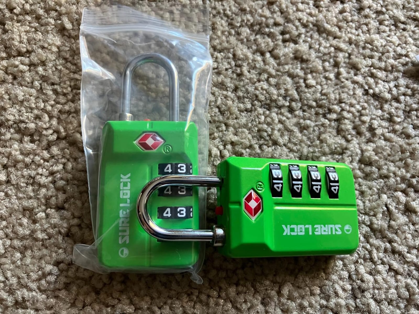 SURE LOCK TSA Approved 4-Digit Luggage Lock, Resettable Combination, Red Dot Open-Alert (Resets Only with Code), Easy-Read Black/White Dials, Hardened Shackle, Zinc Alloy (Pink 1 Pack) customer photo 1