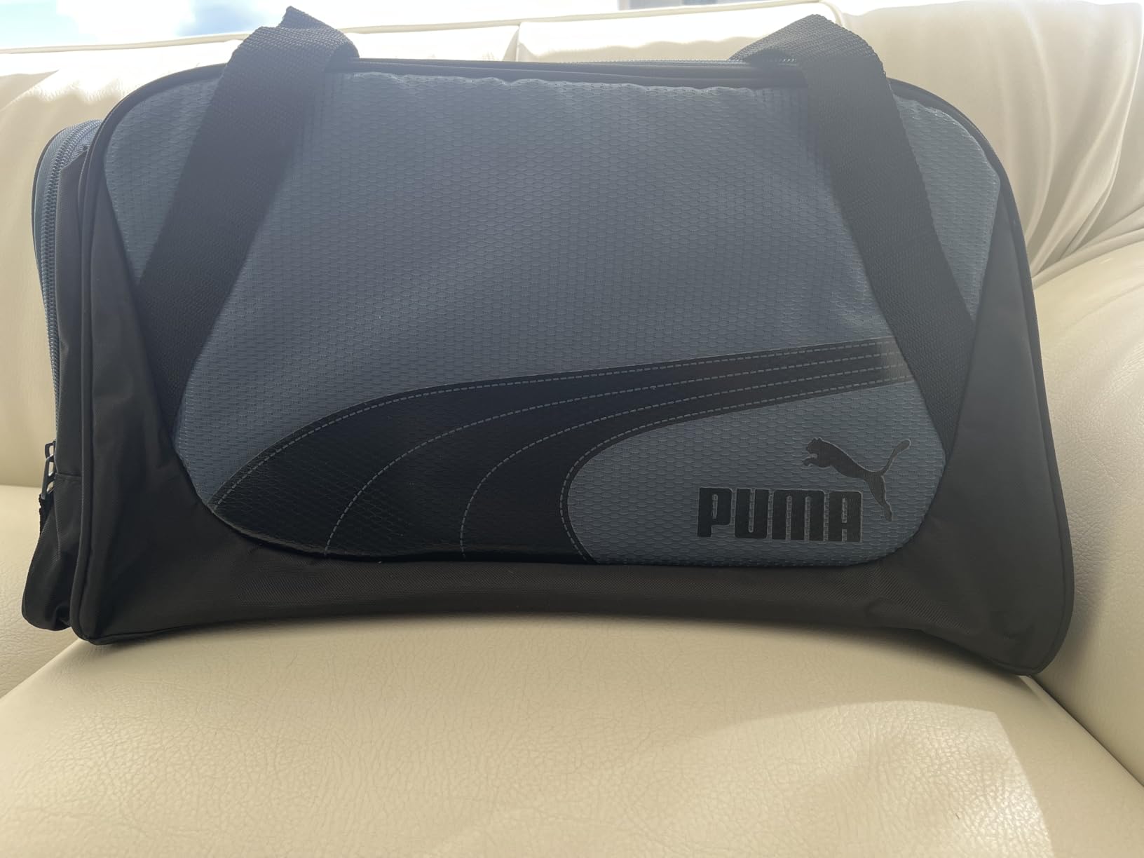 PUMA unisex-adult Form Factor Duffel with Adjustable Strap, Padded Bottom & Zip Pockets customer photo 2