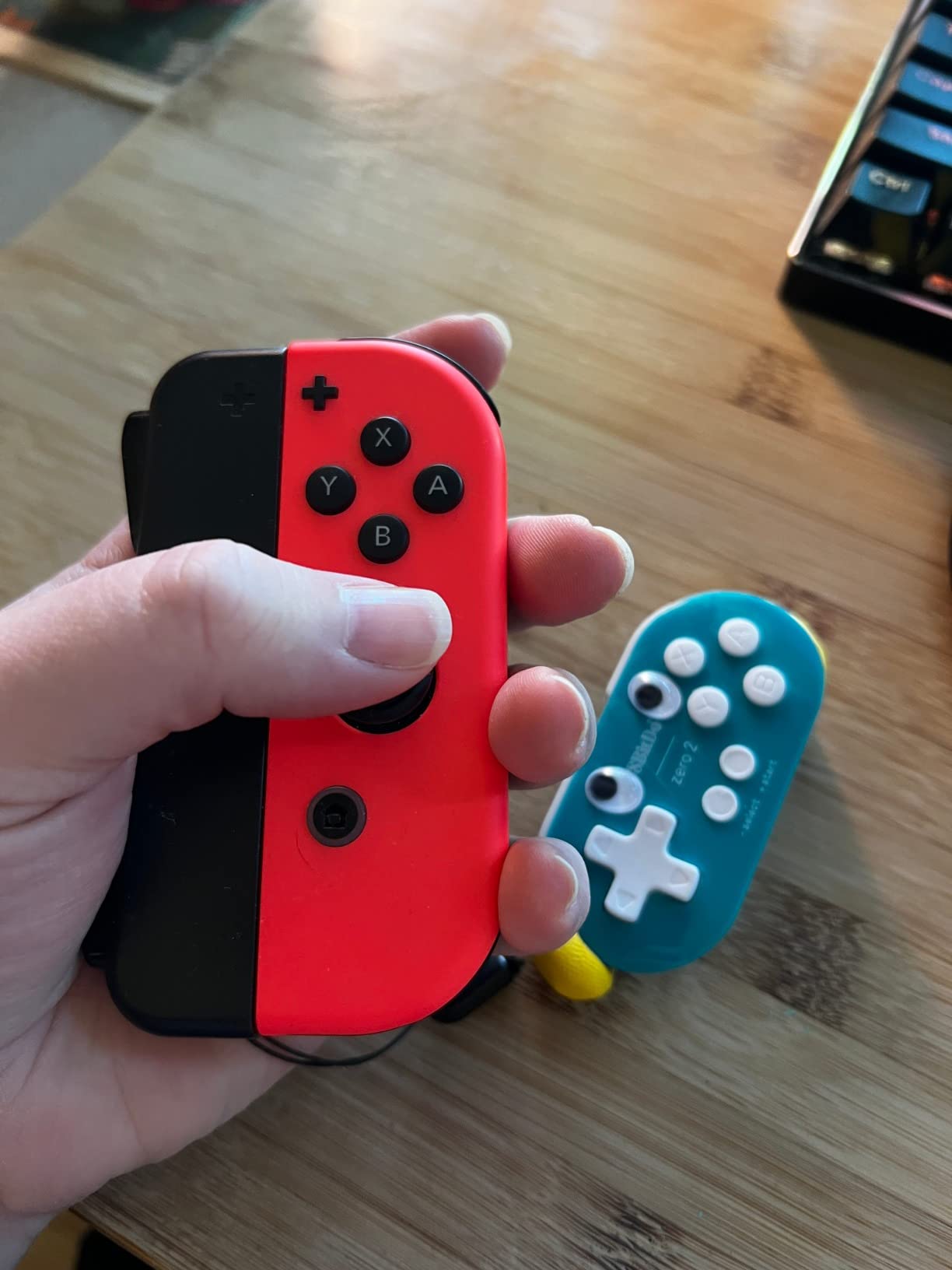 8Bitdo Zero 2 Bluetooth Gamepad Keychain Sized Mini Controller for Switch/Switch 2, Windows, Android (Turquoise Edition) customer photo 2