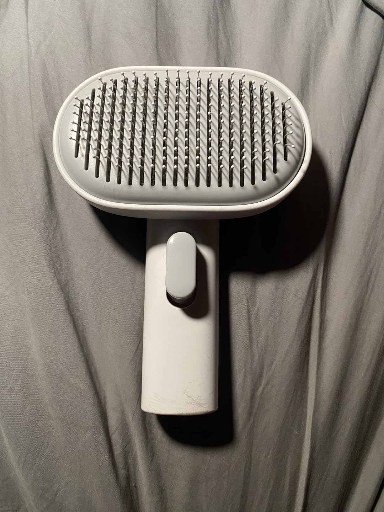 Aumuca Skin Friendly Self-Cleaning Slicker Brush for Dogs & Cats, Gentle Pet Grooming Tool for Shedding & Deshedding, Efficient Hair Remover for Long & Short Haired Pets customer photo 1