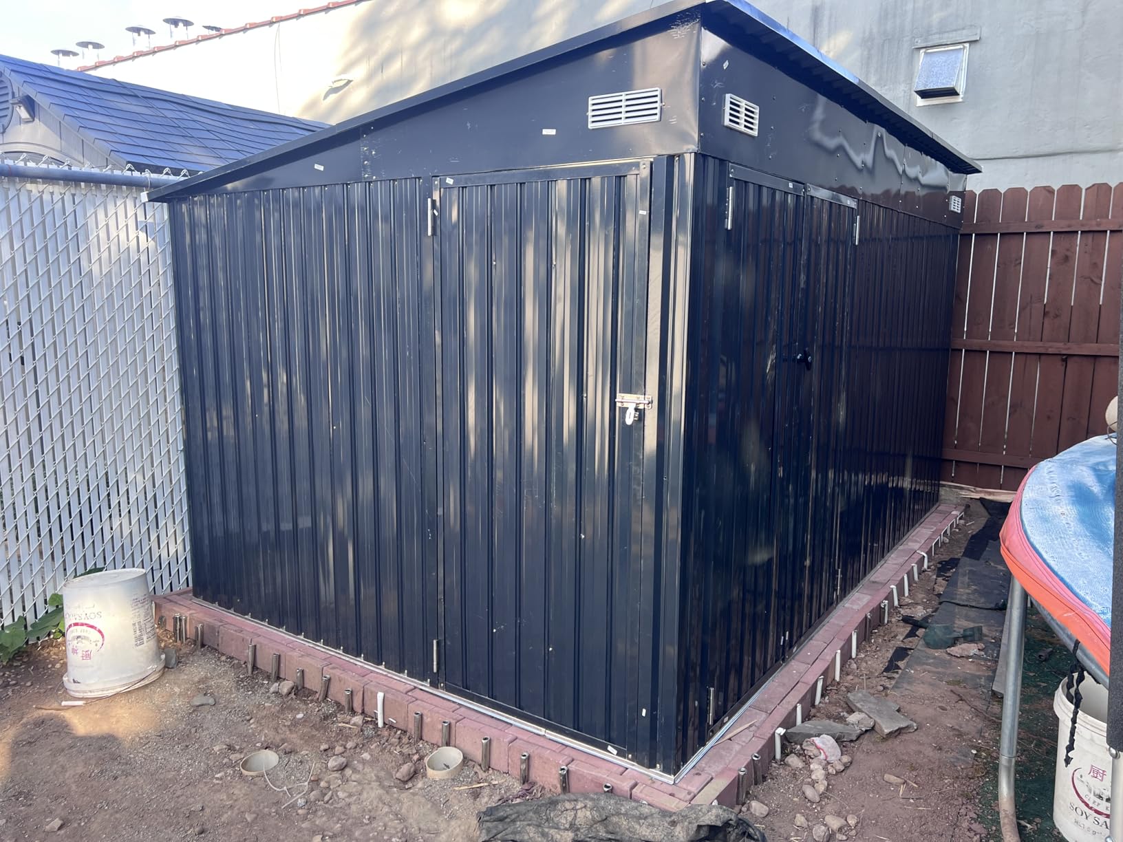 8'x12' Outdoor Lean to Storage Shed with Triple Doors Utility Galvanized Steel Sheds for Vertical Storage, Dual Lock Metal Shed with Sloped Roof for Mower,Bike,Garden Tools (Black) customer photo 1